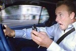 Любителям поговорить по мобильному за рулем вручат фото с мест ДТП
