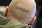 Сотрудников пенитенциарных учреждений Германии научат разбираться в татуировках неонацистов
